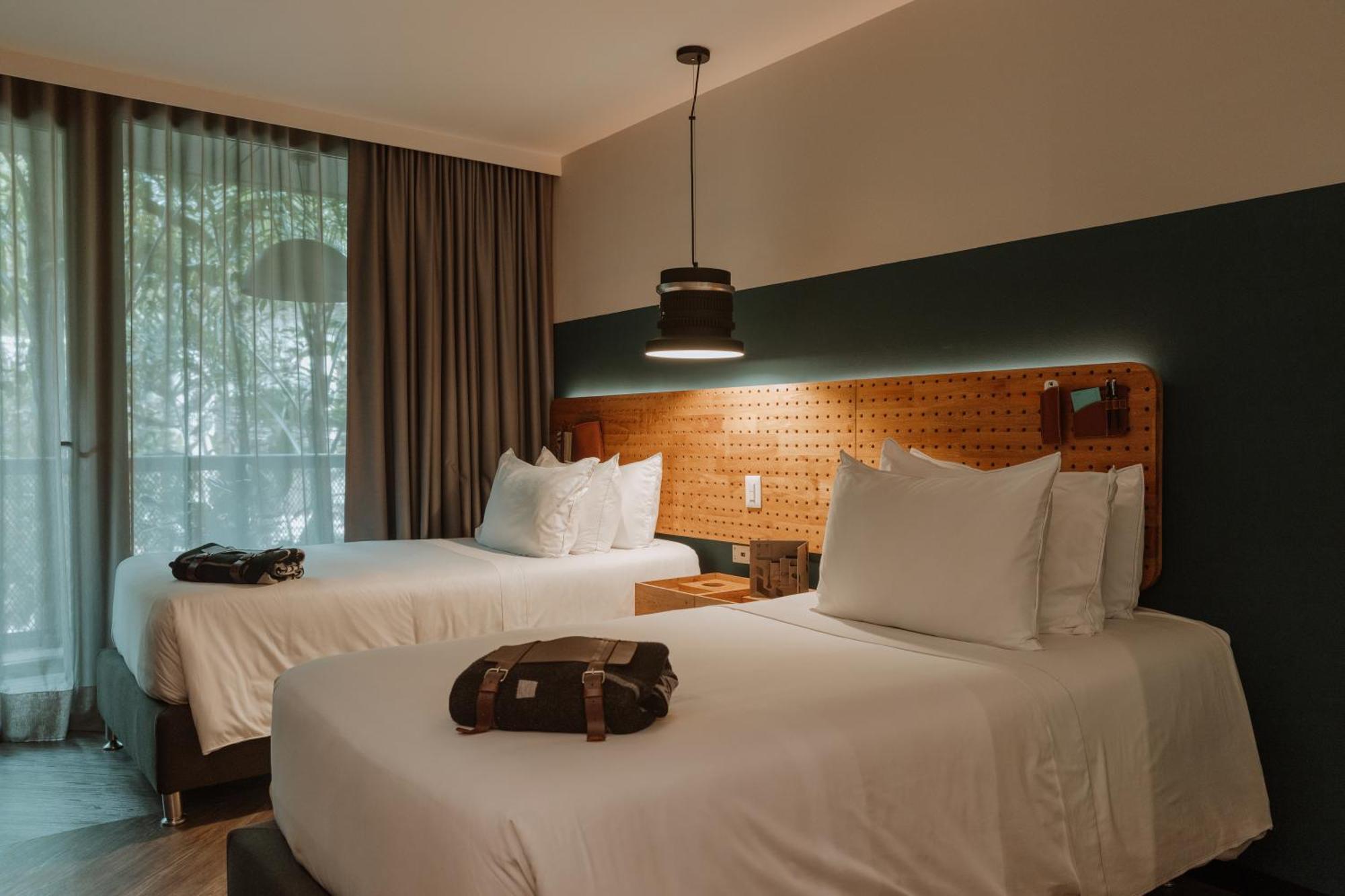 The Click Clack Hotel Медельин Экстерьер фото A room at the hotel