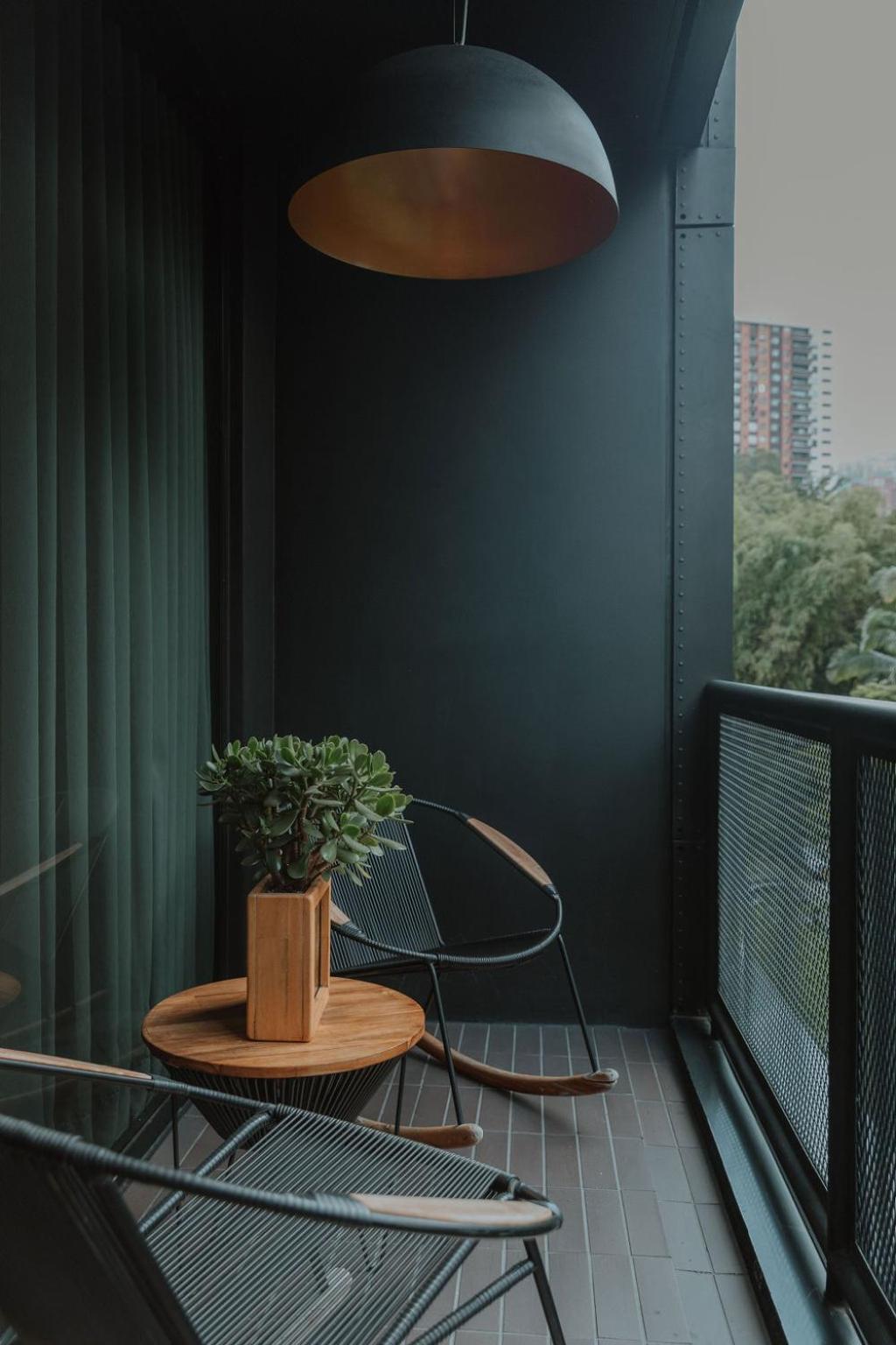 The Click Clack Hotel Медельин Экстерьер фото A balcony in a residential building in China